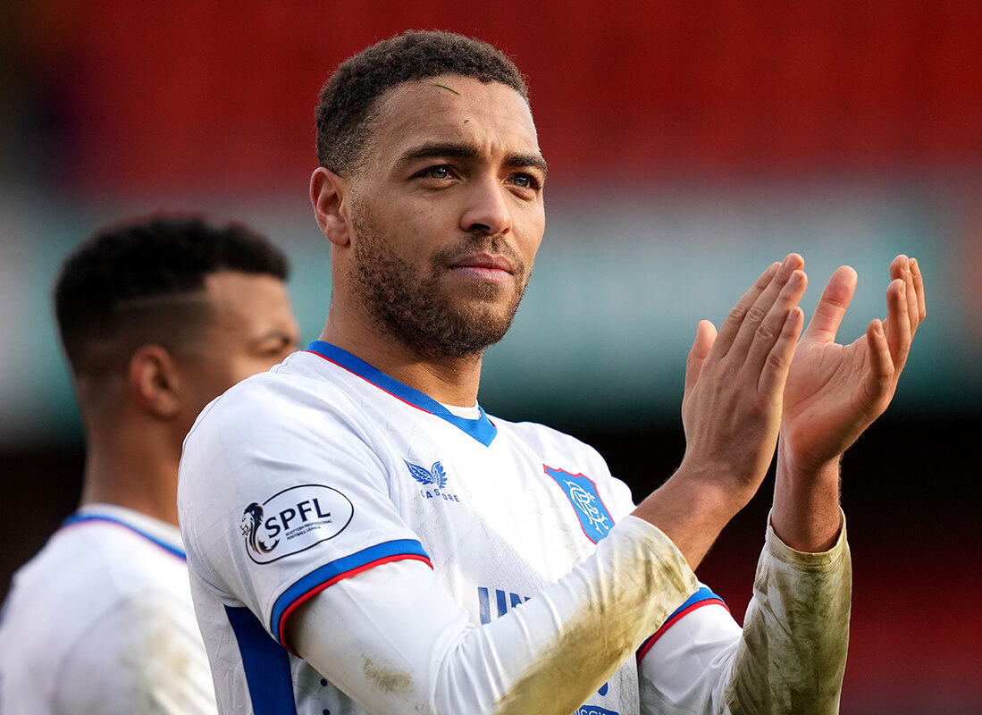 Image showing a player clapping with an SPFL badge on his sleeve