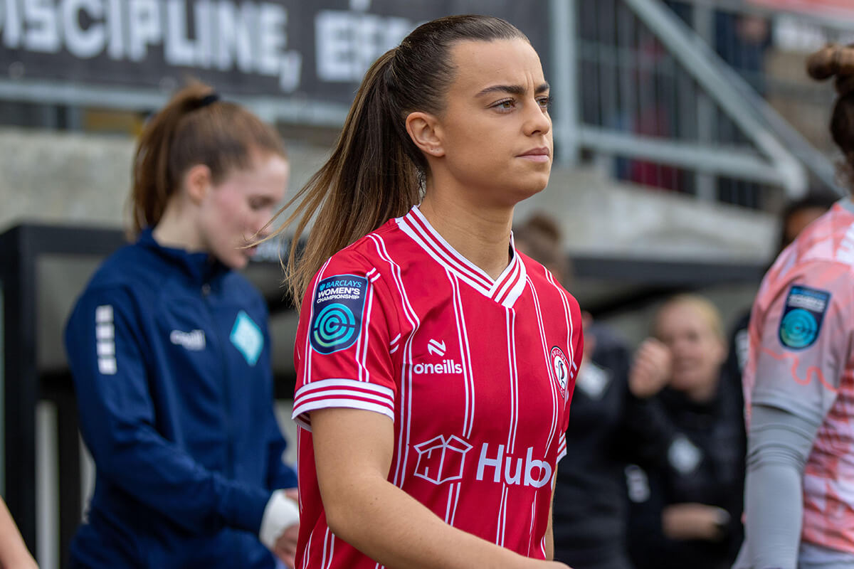 Image showing a Bristol City player walking with a Women's Championship sleeve badge