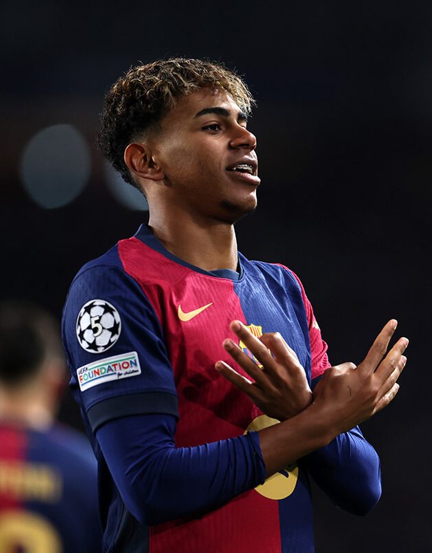 Image showing Lamine Yamal celebrating with a 5 times winner UCL badge