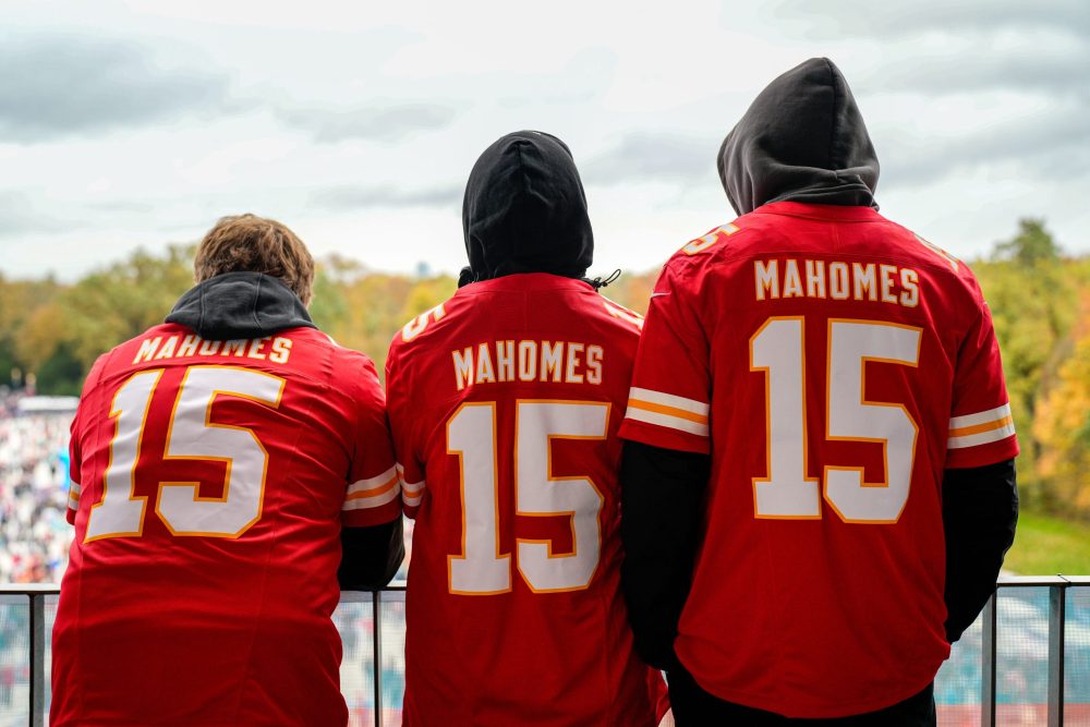 Image showing three fans wearing Mahomes jerseys
